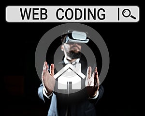 Text caption presenting Web Coding. Word for work involved in developing a web site for the Internet