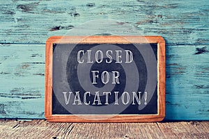 Text closed for vacation in a chalkboard photo
