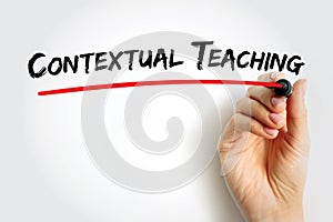 Text Contextual Teaching written with marker and underlined in red by a hand, concept for education, modern pedagogy, and