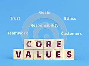 Text core values on wooden cubes with important words