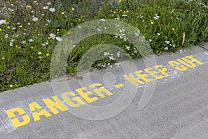 Text Danger Keep Out at an airport