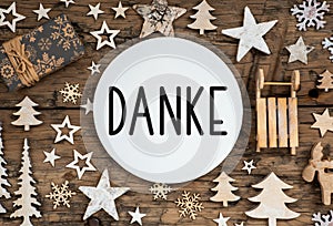 Text Danke, Means Thanks, On Wooden Background, Natural Christmas Decoration