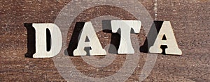 text DATA from wooden letter alphabet in the sun on a sunny day