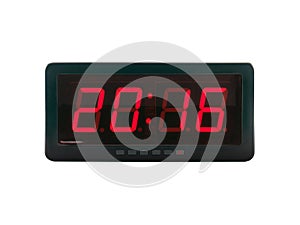 close up red led light illumination numbers 2016 on black digital electric alarm clock face isolated on white background