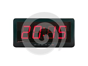 close up red led light illumination numbers 2015 on black digital electric alarm clock face isolated on white background