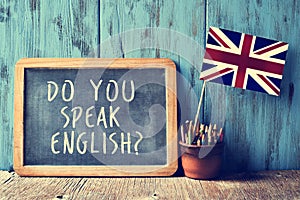 Text do you speak english? in a chalkboard, filtered