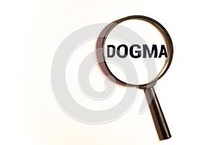 text: DOGMA on magnifying glass