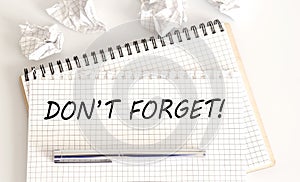 Text don`t forget on notepad on white background. meeting remind reminder note concept