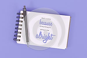 Text `Don`t worry because everything will be alright` in notebook