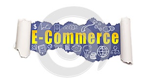 The text E-commerce behind torn white paper