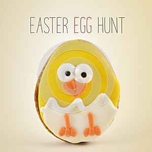 Text Easter egg hunt and chick in an egg