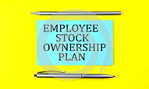 Text Employee Stock Ownership Plan on the blue sticker on the yellow background