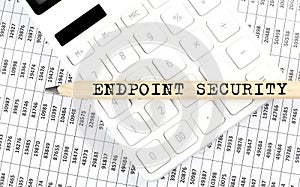 Text ENDPOINT SECURITY on the wooden pencil on the calculator with chart