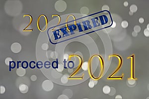 Text Expire 2020 proceed to 2021 year on bokeh gray background