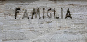 Text FAMIGLIA that means famiyl in Italy Language photo