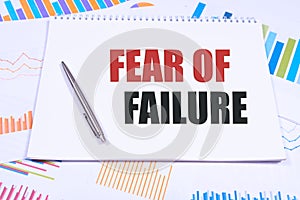text fear of failure , isolated white background with printer and folders. business concept.