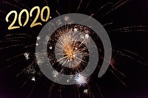 2020 Text with Festive Gold Fireworks Collage in Night Sky. Copy space. Greeting card