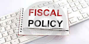 Text fiscal policy on keyboard on the white background