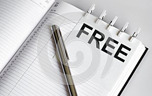 Text FREE on the short note texture background with pen