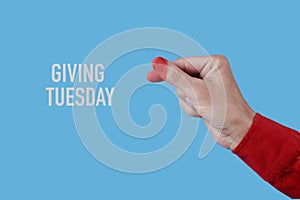 text giving tuesday and finger heart gesture