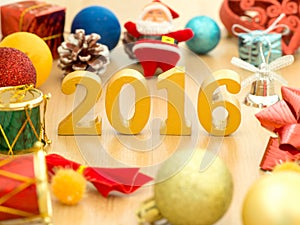 Text of gold 2016, make from wood. Golden year 2016. New year decoration, closeup on 2016 text. Happy new year 2016. Gold 2016 on