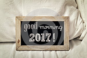 Text good morning 2017 in a chalkboard