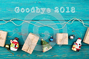 Text "Goodbye 2018", Christmas or New Year presents and Christmas toys