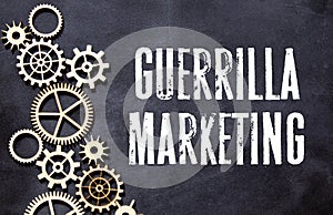 text Guerrilla Marketing on black background, concept