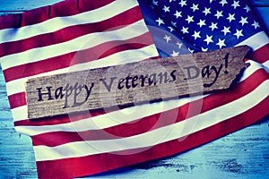 Text happy veterans day and the flag of the US