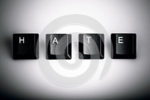 Text hate formed with computer keyboard keys on white background