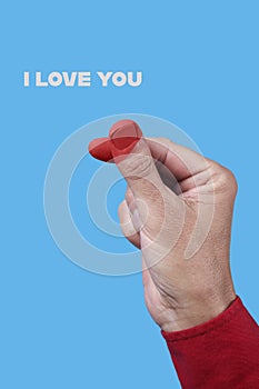 text I love you and finger heart gesture