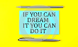 Text If you can dream it, you can do it on the blue sticker on the yellow background