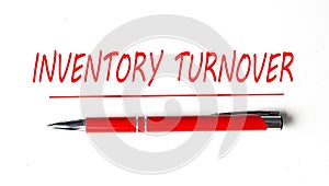 Text INVENTORY TURNOVER with ped pen on the white background