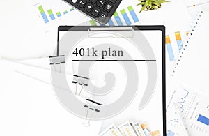 Text 401K Plan is written on a notebook with