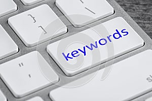 Text KEYWORDS on keyboard button, closeup