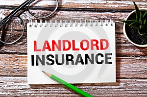 text LANDLORD INSURANCE on white card, concept