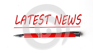 Text LATEST NEWS with ped pen on the white background