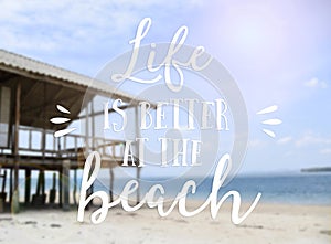 Text life is better at the beach summer quotes with beautiful beach background