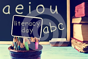 Text literacy day in a chalkboard, in a classroom, filtered
