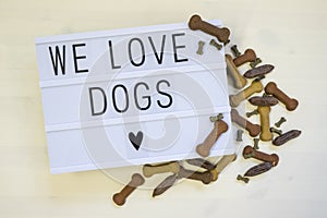 Text We love Dogs written on a lightbox photo
