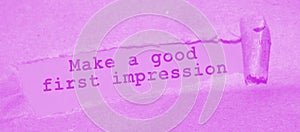 The text Make a good first impression appearing behind torn brown paper