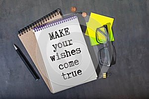 Text make your dream come true on the short note texture background