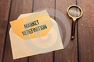 text Market Redefinition on white noteboock