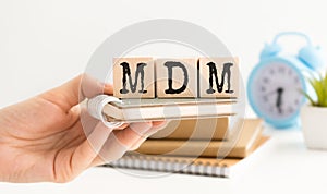 Text MDM as MOBILE DEVICE MANAGEMENT written on cubes