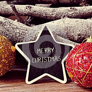Text merry christmas in a star-shaped blackboard