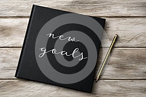 Text new goals in a notebook