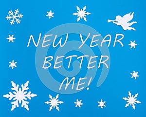 Text NEW YEAR BETTER ME on a blue background with Christmas snowflakes, a white angel. Changes in yourself