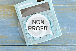 Text NON PROFIT on stickers. Calculator