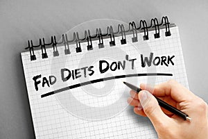 Text note - Fad Diets Don`t Work, health concept on notepad