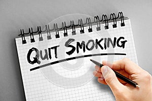 Text note - Quit Smoking, health concept on notepad